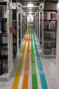 Image showing Museum and library wayfinding floor graphics signage used in a blog post by QPS Print